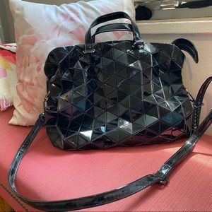Black shoulder bag with geometric detail